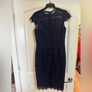 Navy lace dress. Never worn.